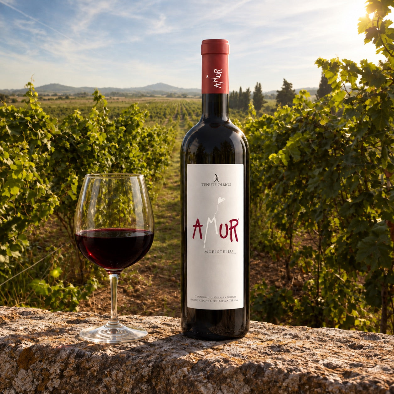 Tenute Olbios organic Amur wine and a glass of red wine in its Sardinian vineyard