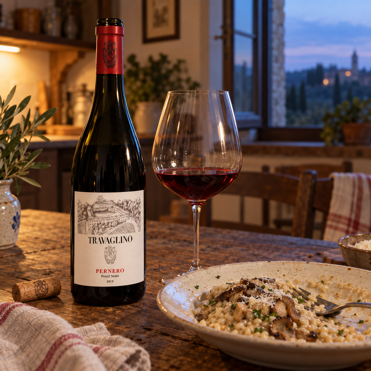 Tenuta Travaglino Pernero Pinot Nero with mushroom risotto and a glass of red wine